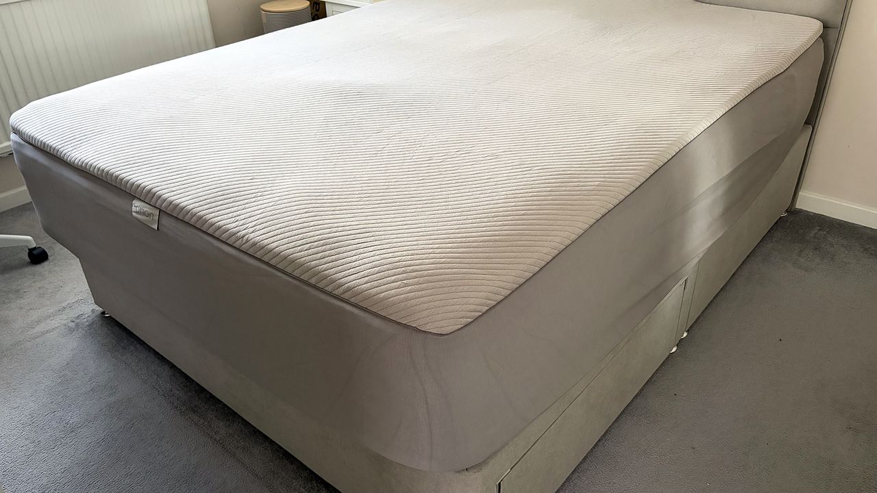 The Orion Sleep System on a mattress in our reviewer's bedroom