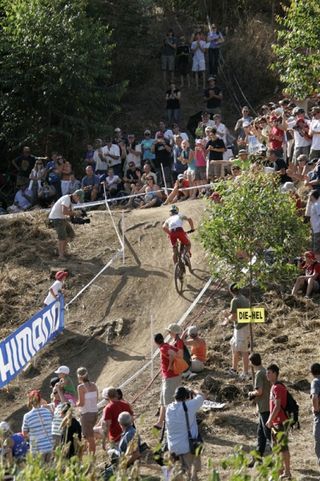 Cheered on by his home-country fans, South African Burry Stander tackles a tough climb at the first round of the 2009 UCI World Cup