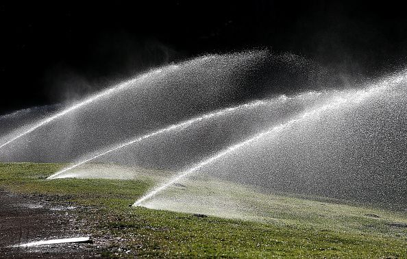 Sprinklers on a lawn.