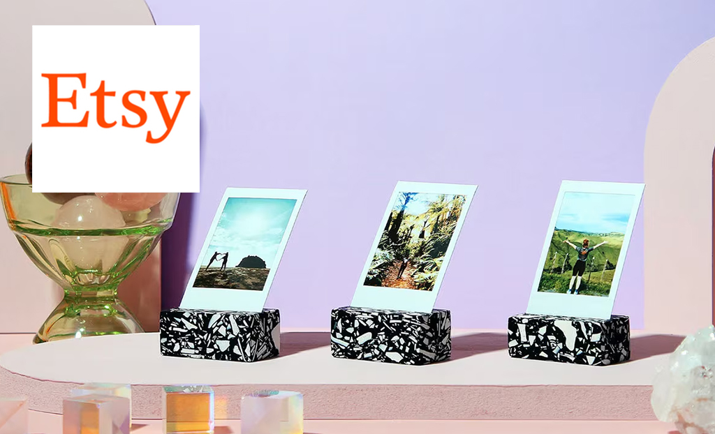 Polaroid picture stands on a lilac background