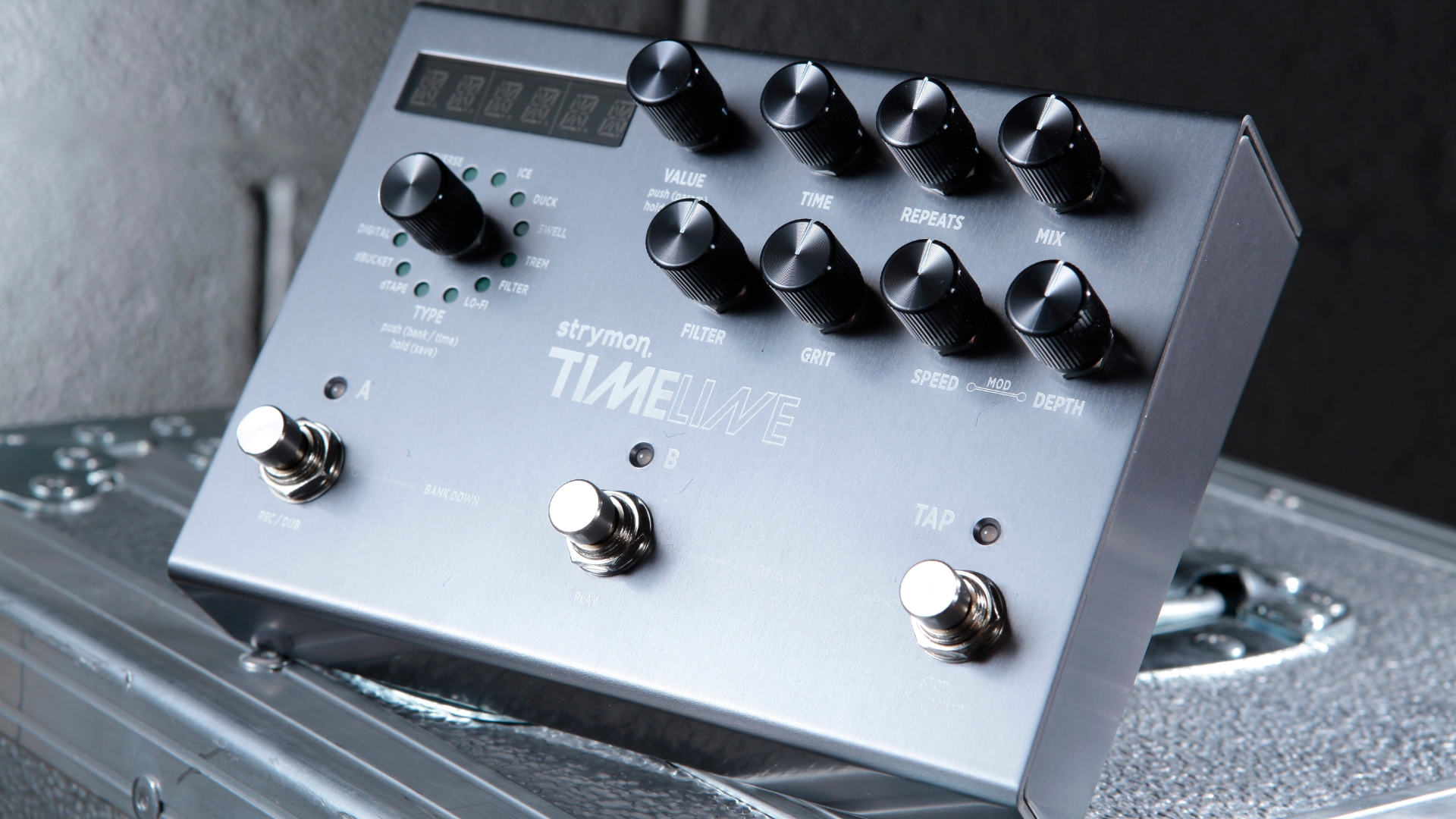 A Strymon Timeline delay pedal on top of a flight case