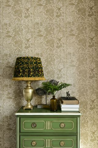 botanical wallpaper with green side table, textured patterned lampshade