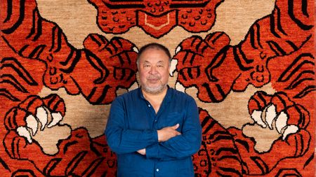 Ai Weiwei with his rug The Tyger, commissioned for Tomorrow’s Tigers and WWF - UK. Curated by Artwise, fabricated by Christopher Farr