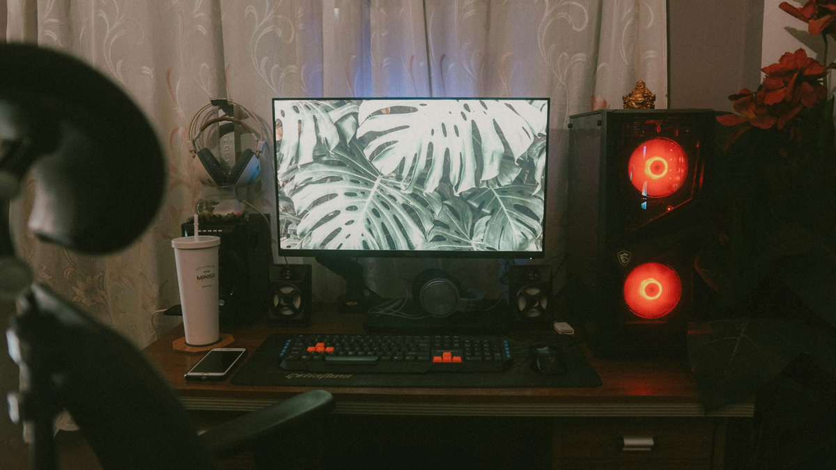 A computer and monitor in a home office