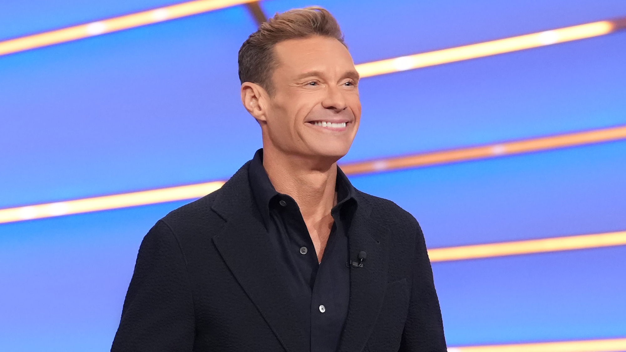 Ryan Seacrest is shown on Celebrity Wheel of Fortune.