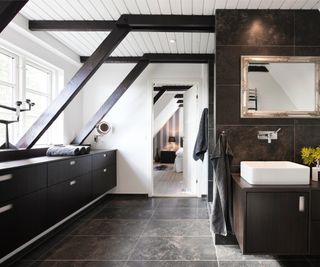 bathroom with black beams