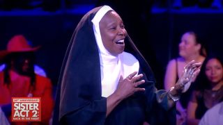 Whoopi Goldberg wearing a habit, in the middle of conducting the Sister Act 2 reunion, on The View.