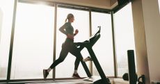 A woman running on one of the best treadmills