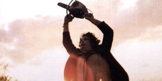 Leatherface raises his chainsaw into the air in 1974's 'The Texas Chain Saw Massacre'