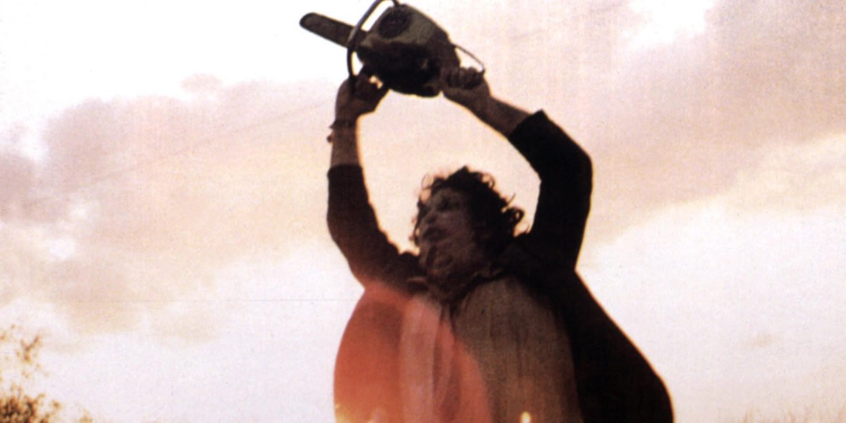 Leatherface raises his chainsaw into the air in 1974&#039;s &#039;The Texas Chain Saw Massacre&#039;