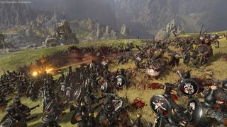 Total War: Warhammer 3 Chaos Dwarfs fighting Greenskins