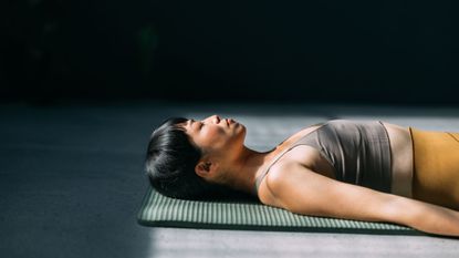 A woman trying the Operation 66 fitness challenge at home