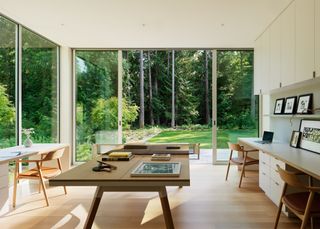 Interurban Residence, a low timber home with minimalist style and light wood tones