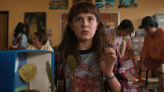 Millie Bobby Brown in a press image from Netflix as Eleven at school during Season 4 of Stranger Things.
