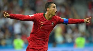 Cristiano Ronaldo celebrates after scoring for Portugal against Spain at the 2018 World Cup.
