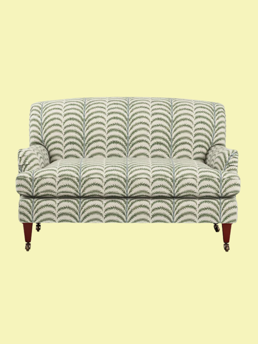 A fern patterned two-seater sofa from OKA