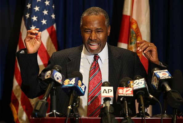 Ben Carson talks to the media at PGA National Resort in Palm Beach, FL.