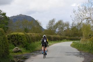Image shows a rider going out on an easy recovery ride.