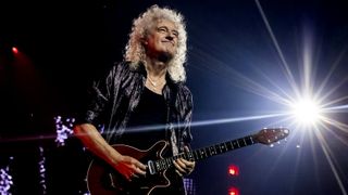 Brian May of Queen + Adam Lambert performs at Little Caesars Arena on October 10, 2023 in Detroit, Michigan.