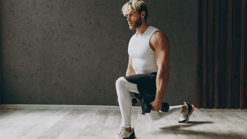 man doing a dumbbell lunge