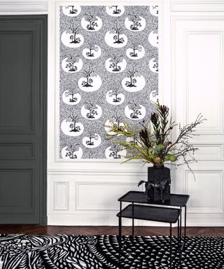 Black and white monochrome wallpaper by Graham and Brown in hallway