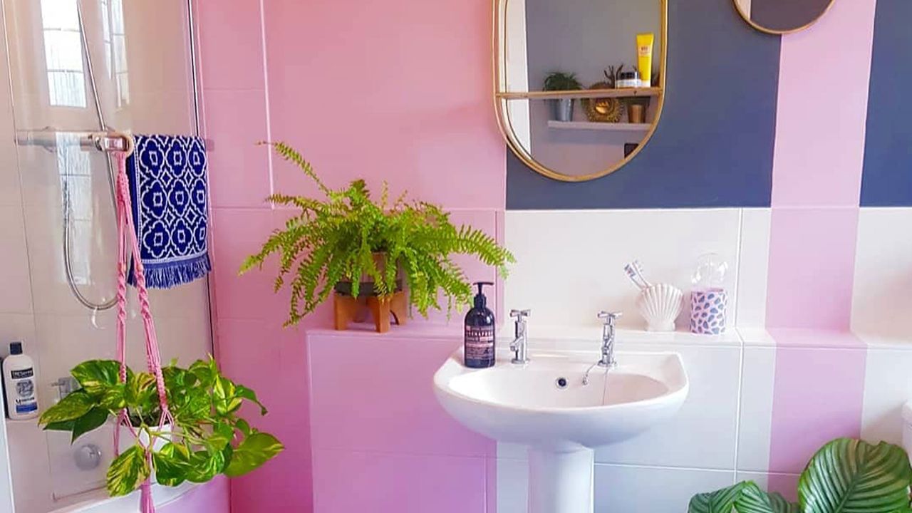 bathroom makeover using color blocking technique in pink and dark blue