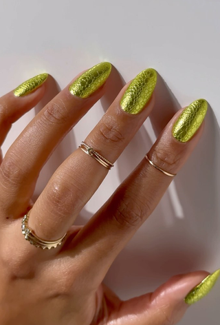 A texture snakeskin-inspired manicure by Imarni.