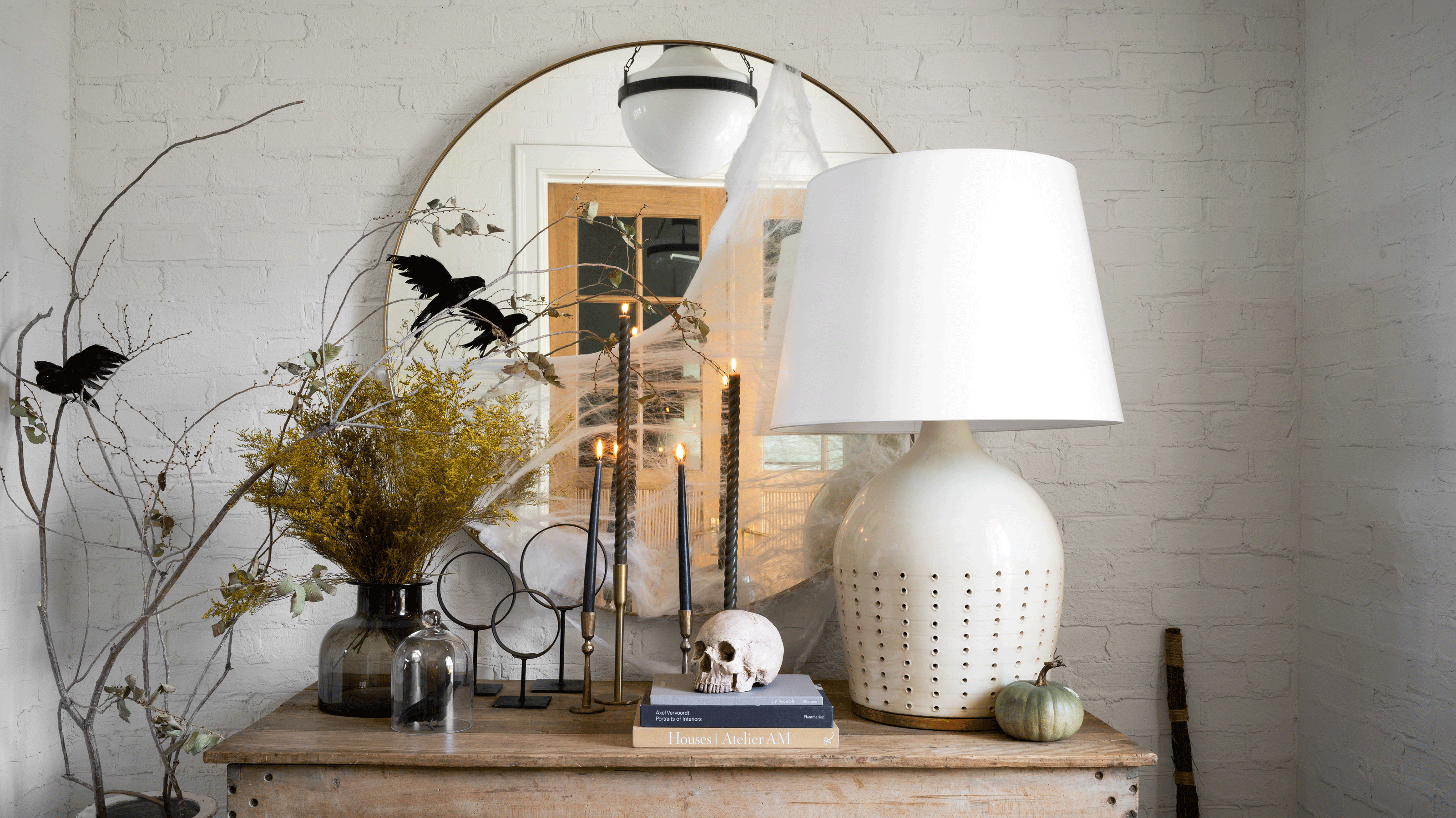 halloween decorations on entryway by studio mcgee