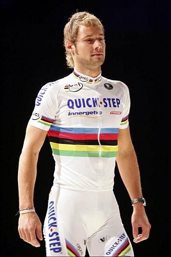 Tom Boonen walks on stage, resplendent in his World Champion's kit