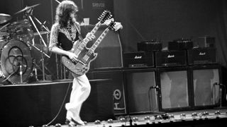 Jimmy Page performs with Led Zeppelin at Madison Square Garden, February 7, 1975. His 1969 Marshall JMP Super Bass 100 amp is at far left in his line of Marshall half-stacks.