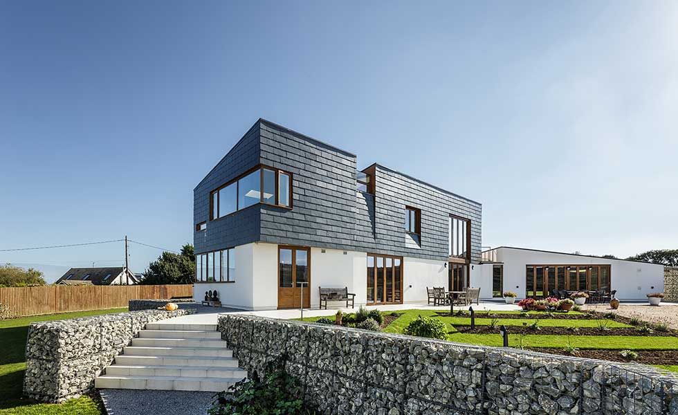 Contemporary cladding and render on selfbuild