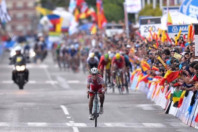 A long shot of the finale with Michal Kwiatkowski (Poland) about to cross the line alone
