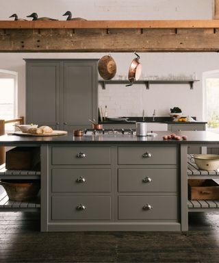 devol gray kitchen with rustic ceiling beams