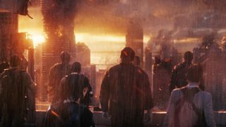 The cast of The Tomorrow War look at a burning Miami cityscape