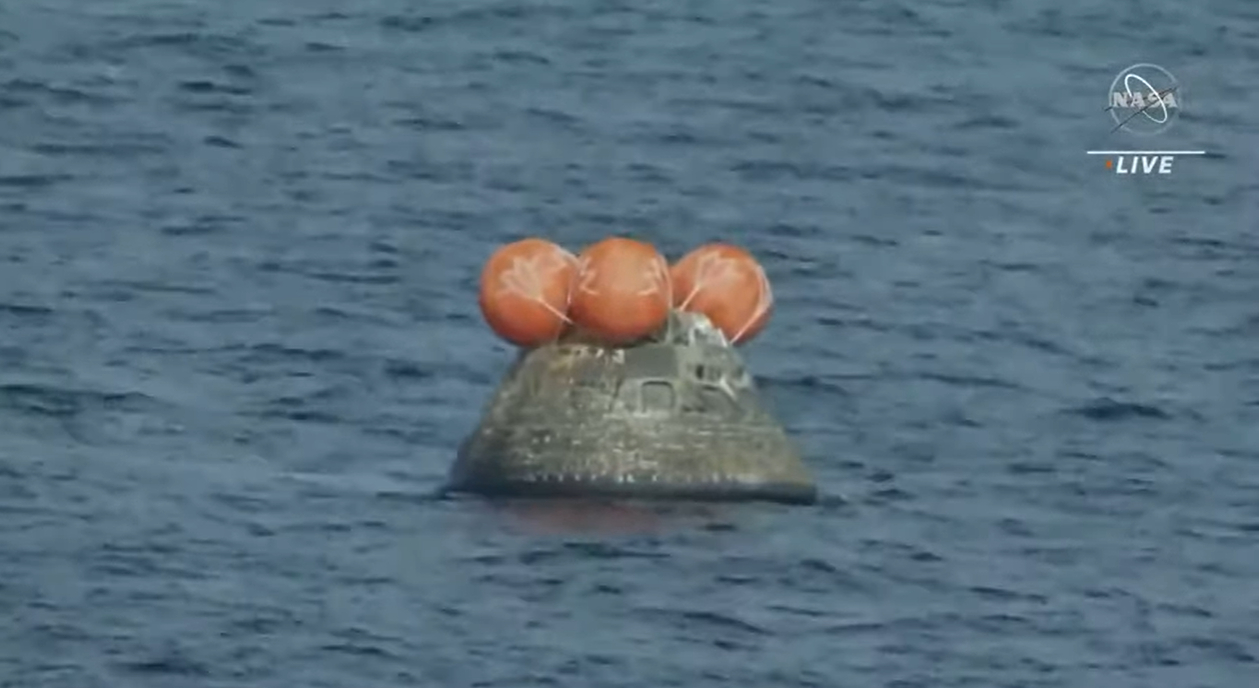 NASA's Artemis 1 Orion spacecraft floats in the Pacific Ocean after a successful splashdown on December 11, 2022.