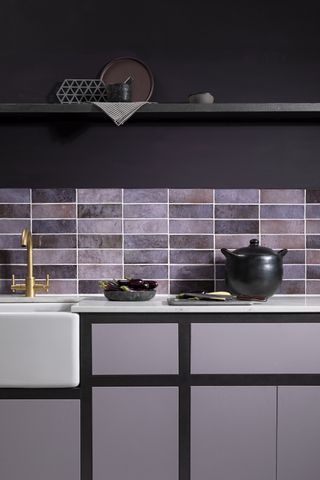 dark purple walls, tiled splash back, purple cabinets