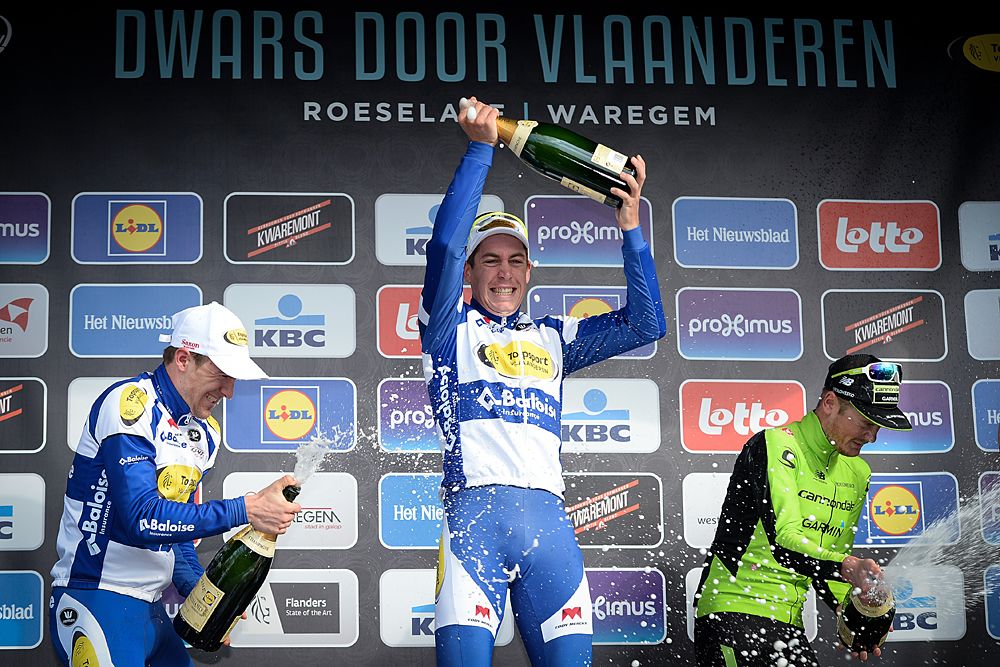 Edward Theuns, Jelle Wallays and Dylan van Baarle on the podium of Dwars door Vlaanderen