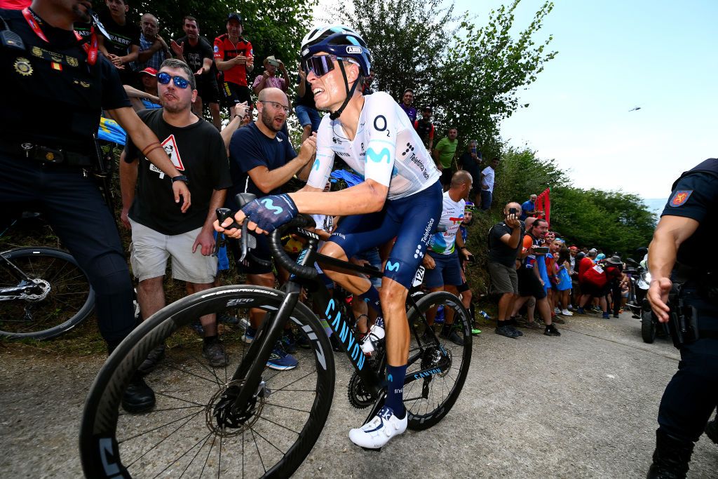 LES PRAERESNAVA SPAIN AUGUST 28 Enric Mas Nicolau of Spain and Movistar Team competes while fans cheer during the 77th Tour of Spain 2022 Stage 9 a 1714km stage from Villaviciosa to Les Praeres Nava 743m LaVuelta22 WorldTour on August 28 2022 in Les Praeres Nava Spain Photo by Tim de WaeleGetty Images