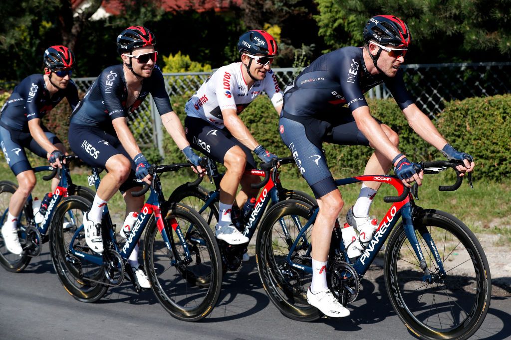 KRAKOW POLAND AUGUST 15 LR Owain Doull of The United Kingdom Michal Kwiatkowski of Poland White Sprint Jersey and Luke Rowe of The United Kingdom and Team INEOS Grenadiers during the 78th Tour de Pologne 2021 Stage 7 a 145km stage from Zabrze to Krakw TourdePologne TDP2021 UCIWT on August 15 2021 in Krakow Poland Photo by Bas CzerwinskiGetty Images