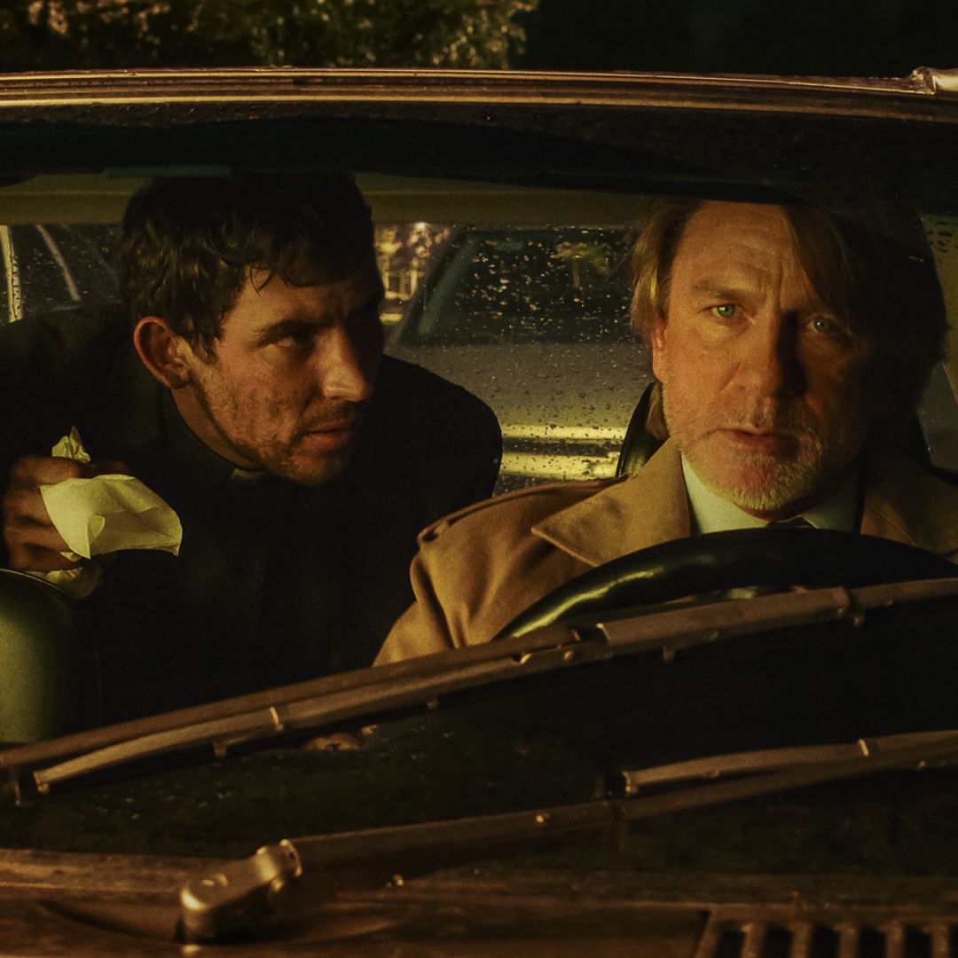 josh oconnor and daniel craig in a car together in a still from knives out wake up dead man