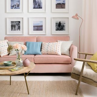 Living room with pink sofa and pink floor lamp