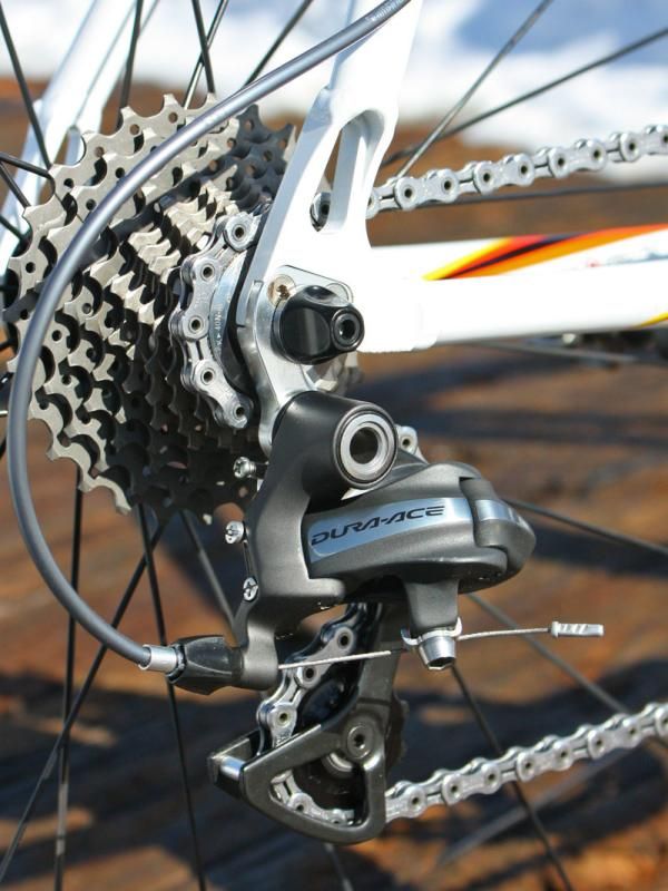 A Dura-Ace 7900 rear derailleur handles chain movement across the cassette while beefier aftermarket hangers from Wheels Manufacturing provide a more stable platform for improved shifting.