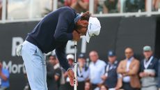 Akshay Bhatia reacts after missing a putt on the 72nd hole at the 2024 Rocket Mortgage Classic