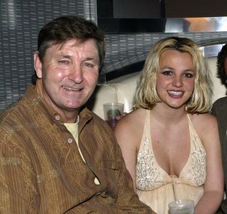 Singer Britney Spears (2nd,L) and family (L-R), father Jamie, brother Bryan and mother Lynne celebrate with Jamie Spears's partners (not shown) George and Phil Maloof and John Decastro, at the launch party for their new Palms Home Poker Host software held at the one of a kind Hardwood Suite at the Palms Casino Resort in Las Vegas. (Photo by Chris Farina/Corbis via Getty Images)