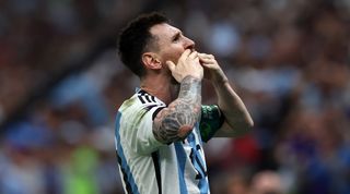 Lionel Messi celebrates after scoring for Argentina against Mexico at the 2022 World Cup in Qatar.
