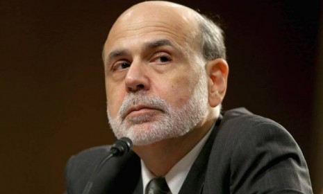 Federal Reserve Board Chairman Ben Bernanke testifies before the Senate Banking, Housing and Urban Affairs Committee on July 17 in Washington, D.C.: Bernanke warned that economic growth in th