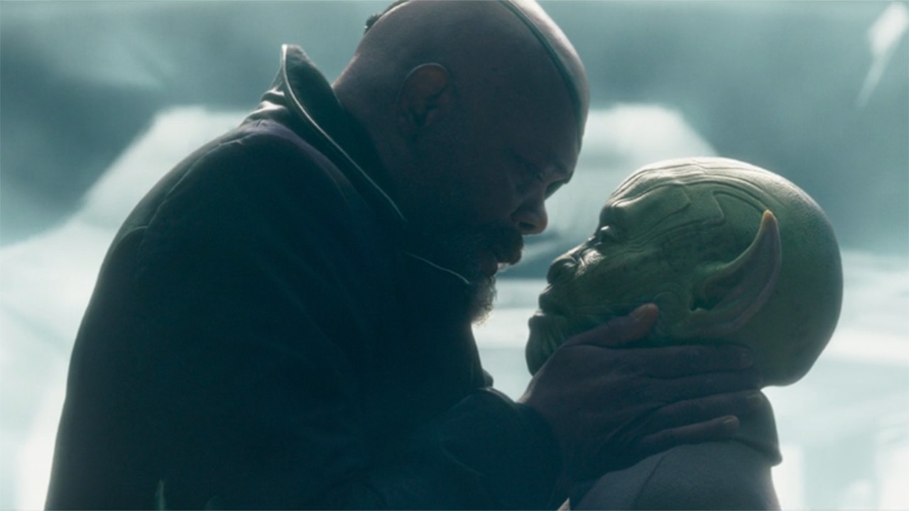 Scene from the Marvel TV show Secret Invasion. Here we see a still from Secret Invasion season 1 episode 6 - Nick Fury and Varra kiss.