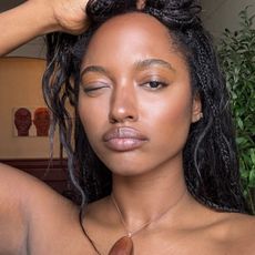 A person with defined eyebrows.