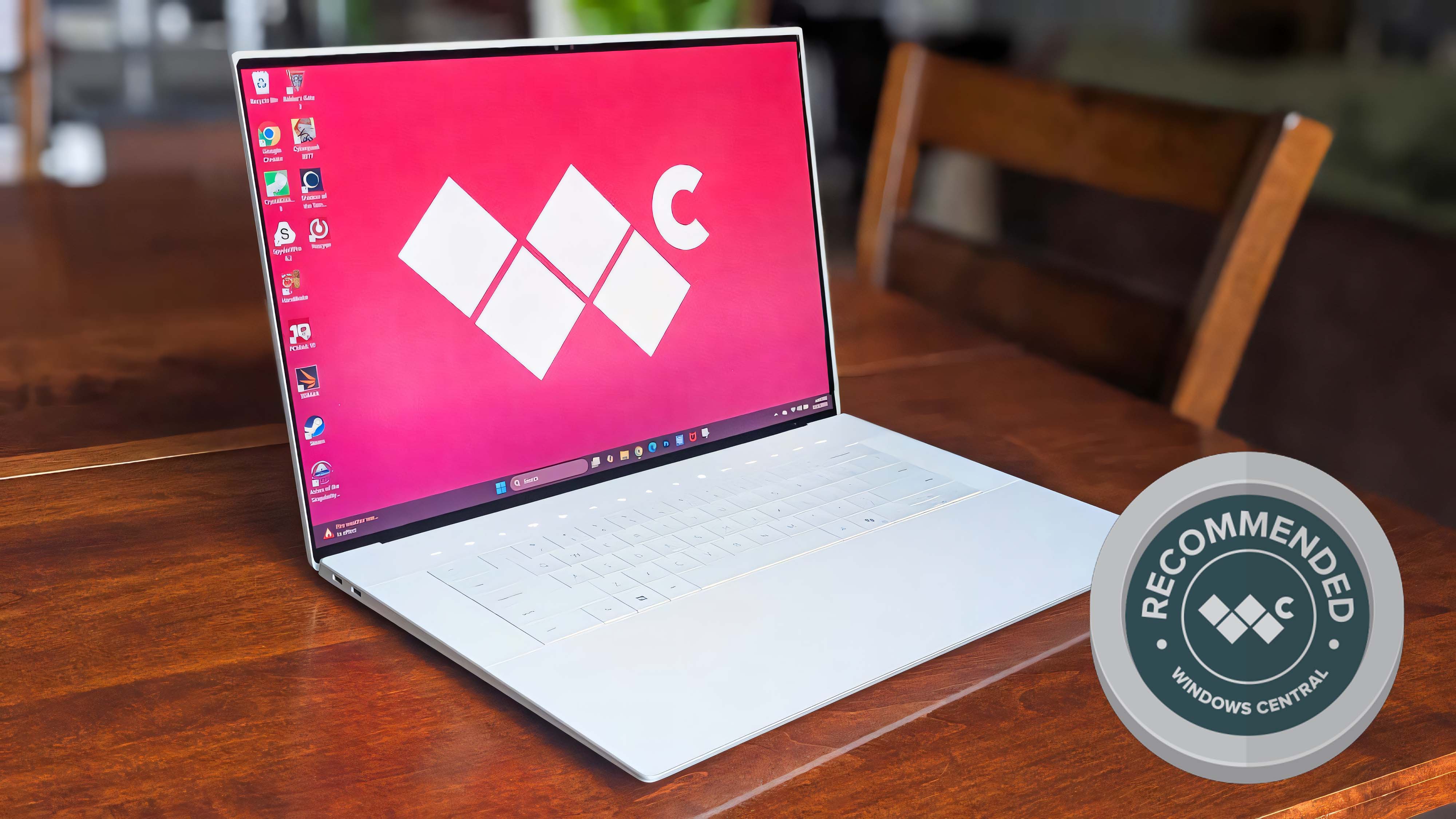 Dell 16 Premium on table with a graphic on top that says, "Recommended Windows Central."