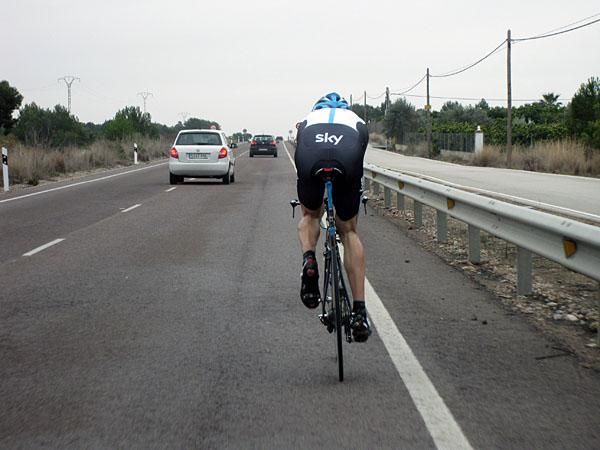 Dario Cioni puts in the big ones out on the road.